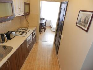 A kitchen or kitchenette at Hagia Sophia Apartment