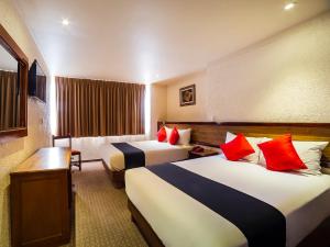 Кровать или кровати в номере Hotel Don Simon