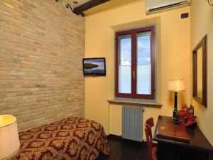 TV a/nebo společenská místnost v ubytování Hotel Bonconte