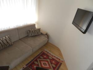 A television and/or entertainment centre at Hagia Sophia Apartment