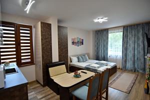 Postel nebo postele na pokoji v ubytování Madini apartment