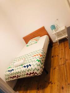 Posteľ alebo postele v izbe v ubytovaní ordizia piso con vistas al parque