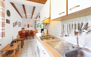 A kitchen or kitchenette at Ferienhaus 13 In Thalfang