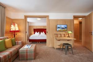 Postel nebo postele na pokoji v ubytování Boutique-Hotel Schmelzhof + 37 fotografií