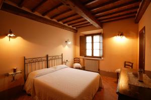 Posteľ alebo postele v izbe v ubytovaní Agriturismo Podere San Gregorio