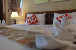 Postel nebo postele na pokoji v ubytování Moosiyard Hometel Khaoyai