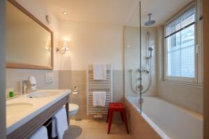 Koupelna v ubytování Boutique-Hotel Schmelzhof
