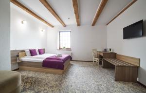 Postel nebo postele na pokoji v ubytování Coin Hotel