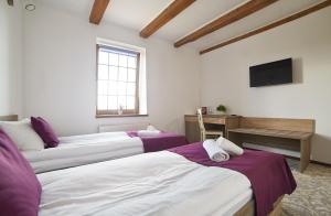 Postel nebo postele na pokoji v ubytování Coin Hotel