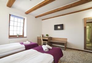 Postel nebo postele na pokoji v ubytování Coin Hotel