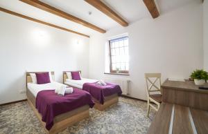 Postel nebo postele na pokoji v ubytování Coin Hotel