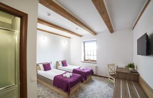 Postel nebo postele na pokoji v ubytování Coin Hotel