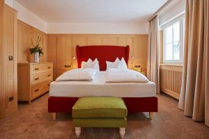 Postel nebo postele na pokoji v ubytování Boutique-Hotel Schmelzhof