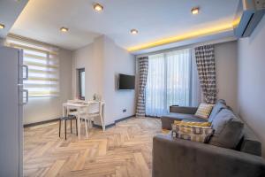 TV a/nebo společenská místnost v ubytování Meyde Boutique Suites