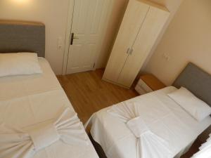 A bed or beds in a room at Hagia Sophia Apartment