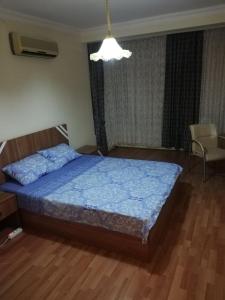 Кровать или кровати в номере KLEOPATRA ALANYA
