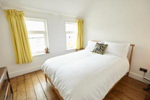 Tempat tidur dalam kamar di Host & Stay - Dane Hill