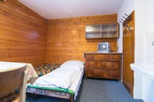 Postel nebo postele na pokoji v ubytování Apartmany Pohořaly