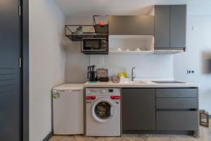 Kuchyň nebo kuchyňský kout v ubytování Meyde Boutique Suites