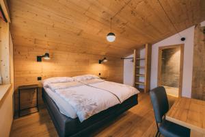 Apart Lodge belMont tesisinde bir odada yatak veya yataklar