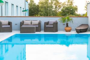 Bazén v ubytování Hotel Abácie & Wellness nebo v jeho okolí