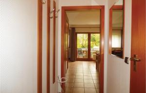 a hallway with a door leading to a balcony at Ferienhaus 22 In Thalfang in Thalfang