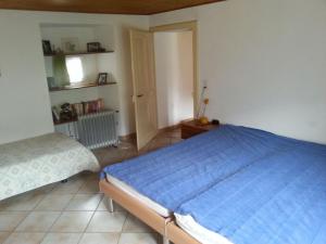 Voodi või voodid majutusasutuse Casa Hürlimann toas