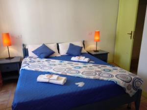 Postel nebo postele na pokoji v ubytování B&B La Dimora del Contadino