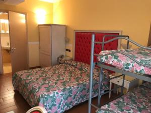 Postel nebo postele na pokoji v ubytování Alle Torri