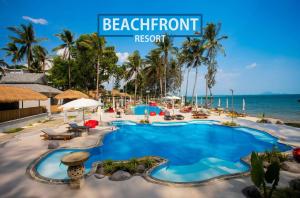 a resort with a swimming pool and the words beachfront resort at Villa Cha-Cha Krabi Beachfront Resort in Ao Nam Mao