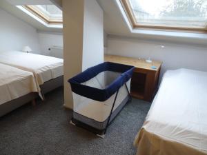 Кровать или кровати в номере De Kersentuin Appartementen