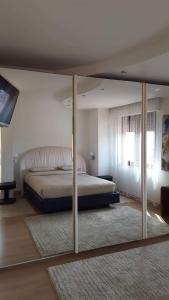 A bed or beds in a room at Sole D'oro IUN S4354