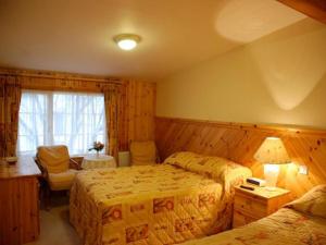 Katil atau katil-katil dalam bilik di Hawthorn House Guesthouse