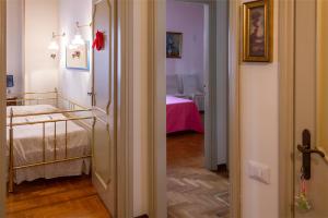 Posteľ alebo postele v izbe v ubytovaní Casa dei Laghi