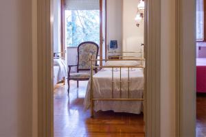 Posteľ alebo postele v izbe v ubytovaní Casa dei Laghi