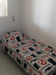 Katil atau katil-katil dalam bilik di Sentral appartement in Torrevieja