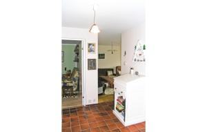 a view of a kitchen from the living room at Nice Apartment In Paulistrm With Kitchen in Pauliström