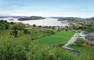 a view of a town and a river at Cozy Apartment In Fitjar in Fitjar