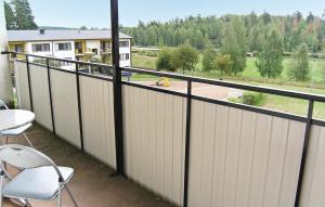 a balcony with a view of a yard at Nice Apartment In Paulistrm With Kitchen in Pauliström