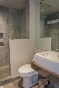 Koupelna v ubytování Hotel Plaza Kokai Cancún