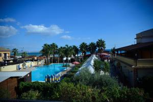 a view of a swimming pool in a resort at Case Vacanze Ancora in Porto Empedocle
