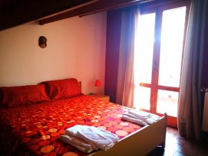 Posteľ alebo postele v izbe v ubytovaní CASALE "GAIA"- Relax nel VERDE con Piscina Privata Esclusiva + 37 fotografií