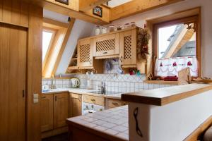 Kuchyňa alebo kuchynka v ubytovaní Giewont Lux - Sauna i Basen
