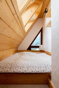 Posteľ alebo postele v izbe v ubytovaní Giewont Lux - Sauna i Basen