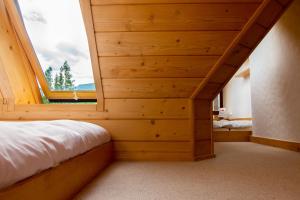 Posteľ alebo postele v izbe v ubytovaní Giewont Lux - Sauna i Basen