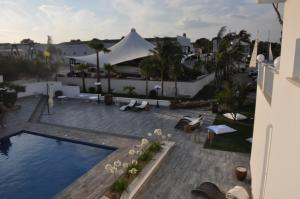 an aerial view of a swimming pool on a building at Female Resort in San Felice Circeo