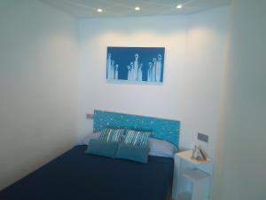 Postel nebo postele na pokoji v ubytování Castillo de Santa Clara Luxury
