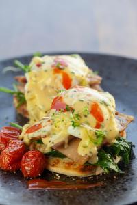 a plate of food with cheese and vegetables on it at Cradle Boutique Hotel in Lanseria +148 photos