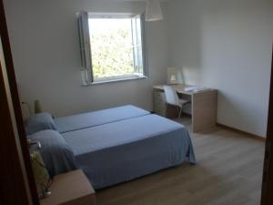 Postel nebo postele na pokoji v ubytování Residence Villa Susy