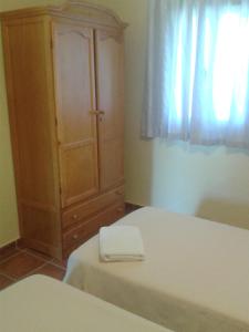 Postel nebo postele na pokoji v ubytování Casa Detrés